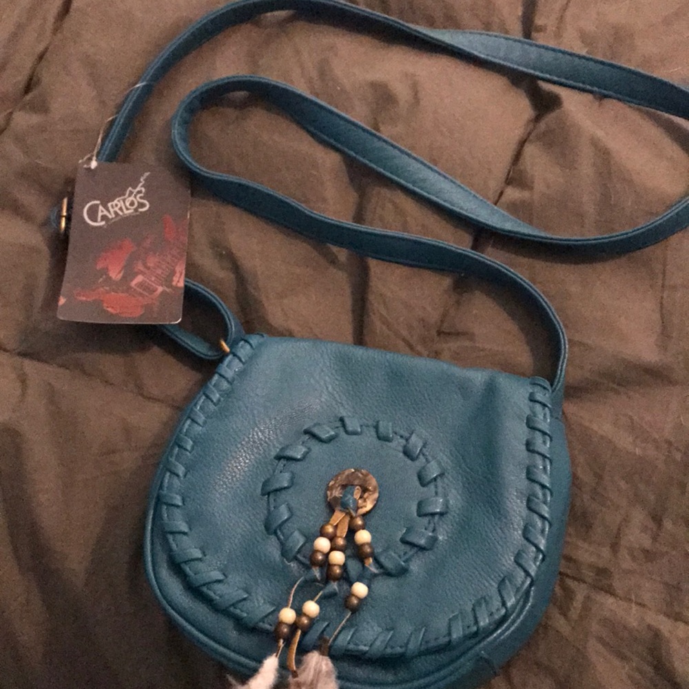 Carlos Santana small purse